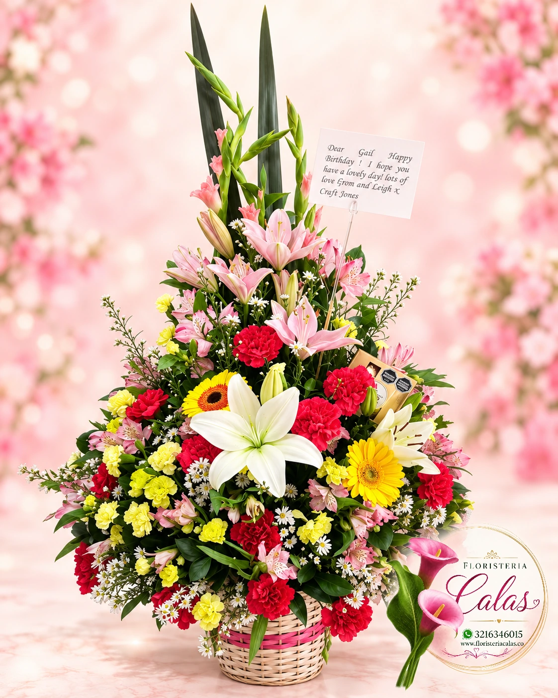 Arreglo floral alto en tonos rosados